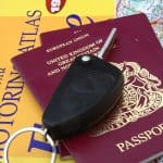 car key travel documents and map