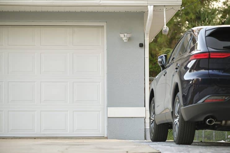 Car parked outside garage