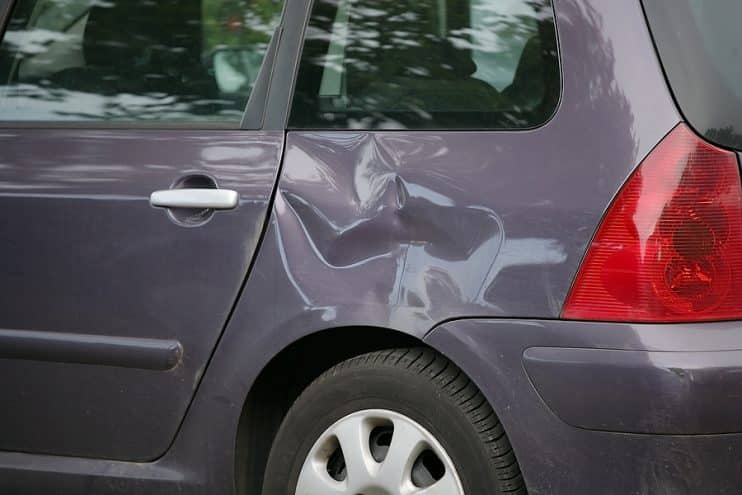 Dented car wing