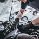 mechanic working on a car