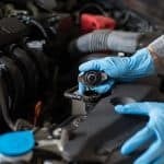 Checking The Engine, Mechanic Checking Car Radiator, Close-up.