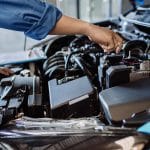 bigstock-Mechanic-Man-Examining-And-Mai-740×493-1