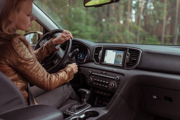 Woman starting car